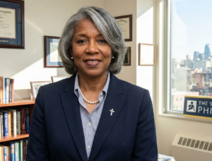 Image of African American woman alone in an office setting